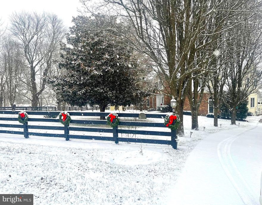 Welcome to the treasured and historic Waterford, Virginia. Embrace a lifestyle that blends tranquility, history, elegance, and recreation in a beautiful established community…all just minutes west of Leesburg along a scenic byway that exudes charm at every turn. As you approach this enchanting hamlet, you’ll be drawn in by rolling landscapes, timeless architecture, and the undeniable sense that something truly special awaits. And just beyond the village, your private oasis reveals itself. Embrace quaint Waterford by stopping into the beloved local corner store for exceptional coffee and fresh pastries before exploring privacy, comfort, and timeless style of 15700 Trapshire Court. A Hidden Gem Steeped in History. Set along a picturesque gravel road (soon to be newly paved), this extraordinary property rests on land once known as the Home Farm, originally purchased in 1770 by the Sanford Ramey family as part of the historic Trevor Hill Plantation. In 1815, the estate transitioned to the Fadeley family, renowned coach makers and influential horse breeders who helped introduce thoroughbreds to Loudoun County. They renamed the land Rosemont at Trevor Hill, preserving the significance of its historical past. Today, this heritage-rich property has become part of a serene enclave encircling the beautifully preserved Historic Home Farm. Designed around a peaceful horseshoe lane with no through traffic, the neighborhood of 1.3 to 5 mil dollar homes offers privacy, quiet, and exclusive access to 123 acres of shared open space which is ideal as a private hunting ground, hiking with pets, equestrian activities, or simply observing the abundant wildlife.  Your Private Resort-Style Retreat. Step into this entertainer’s paradise with a backyard oasis featuring: A fenced resort-sized swimming pool with a slide, waterfalls, and spa features; Two relaxing and therapeutic hot tubs; Hardscapes with a spacious dining area; Pavillion for covered enjoyment and comfort; Mature landscaping, including magnificent 25-year-old magnolias; Your own exquisite orchard with apple, pear, cherry, peach, plum & fig trees; For garden enthusiasts, multiple raised garden beds (protected by deer fencing) provide the perfect canvas for year-round cultivation and farmer’s market worthy fruit and vegetables. Timeless Colonial Elegance. Built in the 1990s and meticulously maintained, this classic colonial home blends traditional charm with modern upgrades, including a new roof, refinished hardwood floors throughout, and a whole house generator. Main Level Highlights: Functional library with built-in bookcases – perfect for a home office; Lovely living room where you can embrace the warmth of the fireplace; Sun-filled sunroom - ideal as a second office; Formal dining room; Large gourmet kitchen with breakfast room that opens to a warm and inviting family room with a pellet burning stove for additional warmth; Mudroom with laundry; Two-car garage; Expansive motor court offers ample paved parking and EV charging. Second Level Highlights: A grand primary suite featuring: a private sitting area, large walk-in closet, expansive bathroom with soaking tub, separate shower, two vanities & private water closet, hard wood floors; Three spacious secondary bedrooms, each with hardwood floors; A beautifully appointed shared bath. Versatile Fully Finished Walk-Out Lower Level: Full in-law or au pair suite with a spacious bedroom and full bath; Complete second kitchen with direct access to the pool; Spacious recreation room with gas fireplace; Ample storage. Additional Features: Upgraded Pella Windows 2016; Whole House Generator; Hot Water Tank Fall 2024; New Roof October 2025; Schedule your personalized private tour today and experience firsthand what makes this exquisite Waterford property unlike anything else on the market.