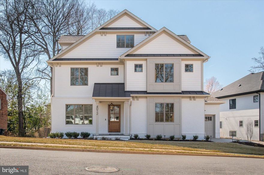 Finished and ready to move in! M-R Custom Homes presents this beautiful new custom home on a quiet cul-de-sac in North Arlington. This home has all of the bells and whistles - featuring 7 bedrooms, 7 full bathrooms, and one powder room with 7,376 square feet of finished living space on four levels and beautiful seven-inch white oak hardwood floors throughout the main and upper levels. The main level includes 10ft ceilings, and a beautiful gourmet kitchen with custom inset maple cabinetry, 2.5" quartz countertops, 48" paneled Subzero refrigerator, 48" Wolf gas range, two paneled Bosch dishwashers, and a built-in Wolf microwave. The kitchen opens to spacious great room with coffered ceiling and a 45-inch wood burning fireplace with stone surround, wood mantle, and flanking built-ins . Through the butler's pantry is an elegant formal dining room with abundant natural light. A large screened porch with skylights, heaters, and speakers provides an amazing outdoor living space overlooking the backyard. A private study, en-suite bedroom, casual family dining area, a mud room with built-ins, and an attached three-car garage complete the main level living spaces. The upper level is highlighted by a luxurious primary suite with vaulted ceilings and exposed wood beams, dual walk-in closets with built-ins, and a coffee bar with custom cabinetry, quartz counter-tops, and beverage refrigerator. The spa-like primary bathroom  features heated floors, double vanities, stand-alone soaking tub, and heavy glass enclosed shower with dual shower heads and rain shower head. The 3rd floor loft offers 900 finished square feet of additional living space with an en-suite bedroom and a large common area with walk-up wet bar and beverage refrigerator. The walk-out lower level includes a spacious recreation room with a gas fireplace with tile and shiplap surround and wood mantle, built-ins, and a full-sized wet bar with peninsula and under-counter beverage refrigerator. An exercise room with rubber flooring and a bedroom with full bathroom round out the lower level living spaces. The 11,622 square foot lot is gently sloping and professionally landscaped with outdoor lighting . The spacious back yard includes a paver patio below the main level screened porch. This home has a built-in elevator shaft for future conversion. Convenient to Glebe Park, Madison Community Center, Washington Golf, Chesterbrook Shopping Center, and much more. Jamestown ES/ Williamsburg MS/ Yorktown HS.