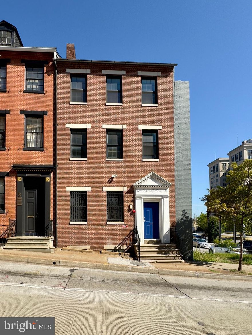Experience city living with comfort and function in this well-appointed 1-bedroom, 1-bathroom basement unit, located in the heart of downtown Baltimore! Set within an end-row brick townhouse, this residence features a clean, neutral interior palette and practical finishes that make it move-in ready and easy to personalize.

The tiled living area is brightly illuminated by an array of pinlights and offers ample electrical outlets, ideal for both everyday use and flexible furniture layouts. The kitchen comes equipped with a full suite of stainless steel appliances, including a dishwasher, microwave, stove with oven, and refrigerator. Built-in cabinetry and glass block windows complement the space with a stylish yet practical touch.

The bedroom mirrors the living space in design, offering tiled floors, neutral colors, a closet, and abundant lighting with multiple outlets to support a modern lifestyle. The bathroom includes a soaking tub with tiled bath surround, lavatory, vanity mirror, and storage drawers for added convenience.

Additional features include an in-unit washer and dryer, access to a responsive 24-hour emergency maintenance service, and a secure online tenant portal for streamlined communication and payments.

Pets under 40 pounds are welcome with a signed pet addendum and a non-refundable fee of $500.

This unit delivers on both convenience and lifestyle, nestled in a location that connects you effortlessly to Baltimore’s vibrant downtown, business districts, dining, and cultural landmarks. Pay parking is available at the side of the building.

Nearby Attractions and Highways

Inner Harbor – 5 minutes

Lexington Market – 4 minutes

Camden Yards – 7 minutes

Walters Art Museum – 3 minutes

Maryland Science Center – 6 minutes

I-83 – 2 minutes

I-95 – 5 minutes

The monthly water bill will be evenly split between occupied units.

Agency disclosed upon initial contact. Agent conducts showings; BMG manages follow-up, paperwork, move-in post-approval. Vouchers work with BMG directly.