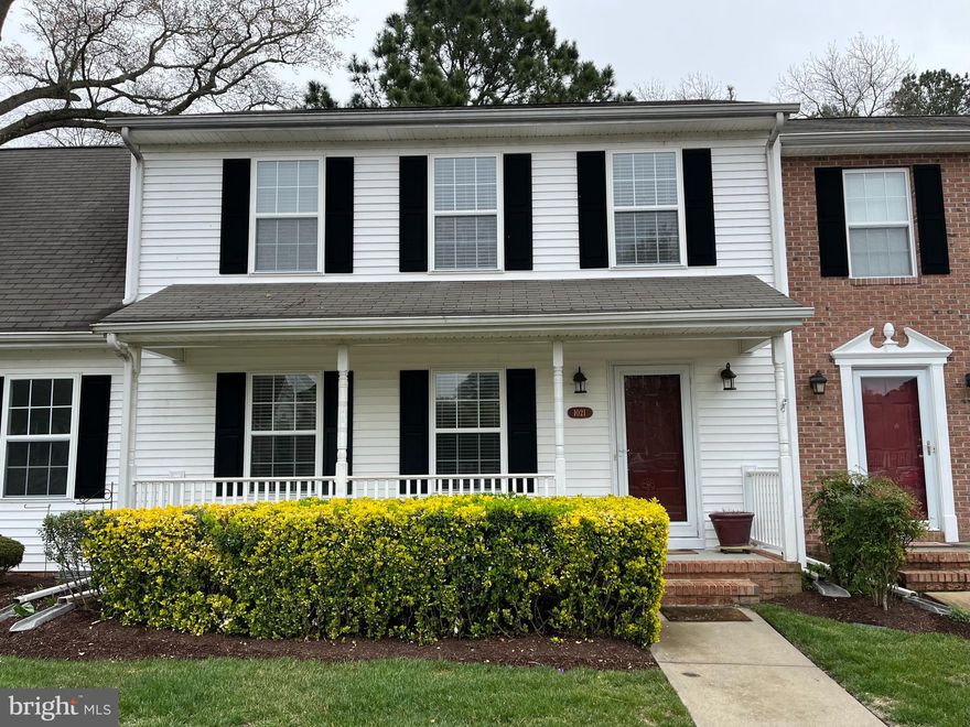 Spacious interior townhouse with inviting front porch and a private rear deck that backs to trees.  The home was updated throughout and move in ready.  The main level features a  open layout, updated kitchen with granite countertops, updated 1/2 bath, and new laminate wood flooring.  The upper level feature updated bathrooms and new carpet throughout.  The unit was freshly painted, all new light fixtures, ceiling fans and window treatments installed, This home is in move in condition