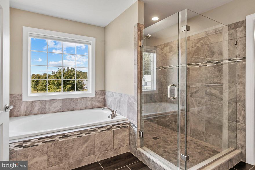 PRICE REDUCTION! OPPORTUNITY TO OWN GORGEOUS HOME!!! 4.5% Assumable Loan!! Back on the market; financing fell through. Move in ready! 3 Acre Lot!  Welcome home to your gorgeous CUSTOM BUILT Wilkerson home ready for immediate occupancy! The elegant LeighAnn floorplan is stunning!  From the oversized wrap around front porch, to the solid oak stairwell entrance, this home is sure to impress!  Enjoy an open concept kitchen, breakfast, and living area to include 4 bedrooms and 3 1/2 baths.  

Features and upgrades include a full finished basement bright and sunny with windows and full bath, hardwood floors, crown molding, tray ceiling, ceramic tile floors, metal railing, oversized tiled shower with two shower heads and two diverters, oversized soaking tub, walk in closet with island, oversized trek deck, paver patio, walk out basement, and the list goes on.  

This 3 acre lot is a dream come true with an enormous flat front and backyard, landscaping, and accommodates a future pool and detached garage, all backing to forest conservation. This unique opportunity to own a truly custom built Wilkerson home full of integrity and craftmanship won't last long! 

Water filtration/UV system with supplies, septic serviced, 50 year transferable warranty on included blinds, new washer in '22 , new dryer in '23, and includes a 1 year home warranty!!