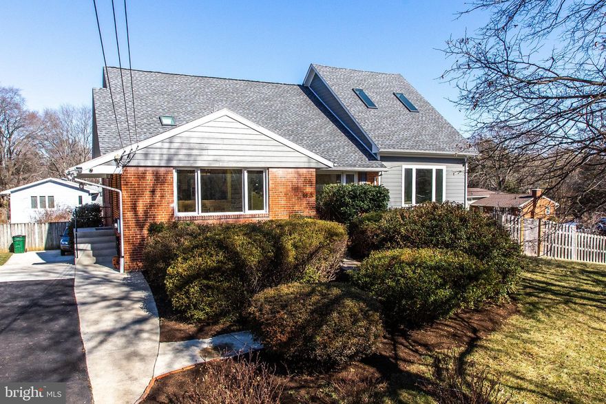 This expanded home in the heart of Mclean has been renovated and updated down to the studs!!
Unique five bedroom home has an In-law suite with its own entrance .  

In 2019 the home was expanded and renovated. 

New roof with spray foam insulation, new windows, new siding, new floors new HVAC and water heater.

For added comfort and efficiency the owner added mini A/C splits on the top floor. 
The home has an exquisite fireplace and mantle which is wired for TV and audio. The most amazing part of this home is that it is outfitted with a Swim Spa 12 feet long 4 feet deep.  

An added bonus is the home has a flex space with its own entrance.  It can be used for an office, gym or the new owner can connect it to the main house if they wish.