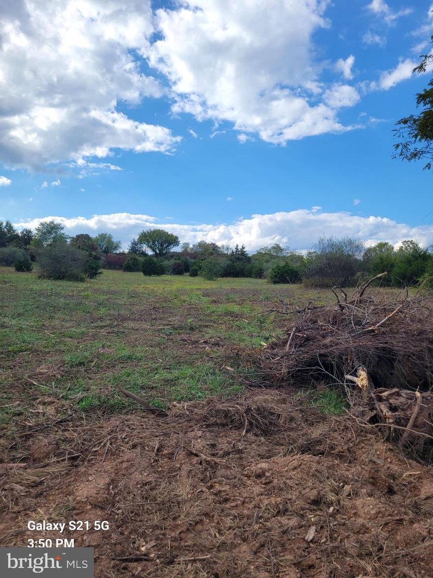 REDUCED!!!   7.38 acres of land offering both privacy and potential. This acreage opens up to scenic views and space for your dream build. A driveway is in place with a transferable entrance permit, and the property has successfully passed a perc test, making it ready for your new home. No homeowners association restrictions—enjoy the freedom to design your property your way. Ideal building site with beautiful views makes this a prime opportunity for your future home or retreat.  This tract has the driveway on Rowzee Rd but fronts on Jersey Mountain Rd, too.