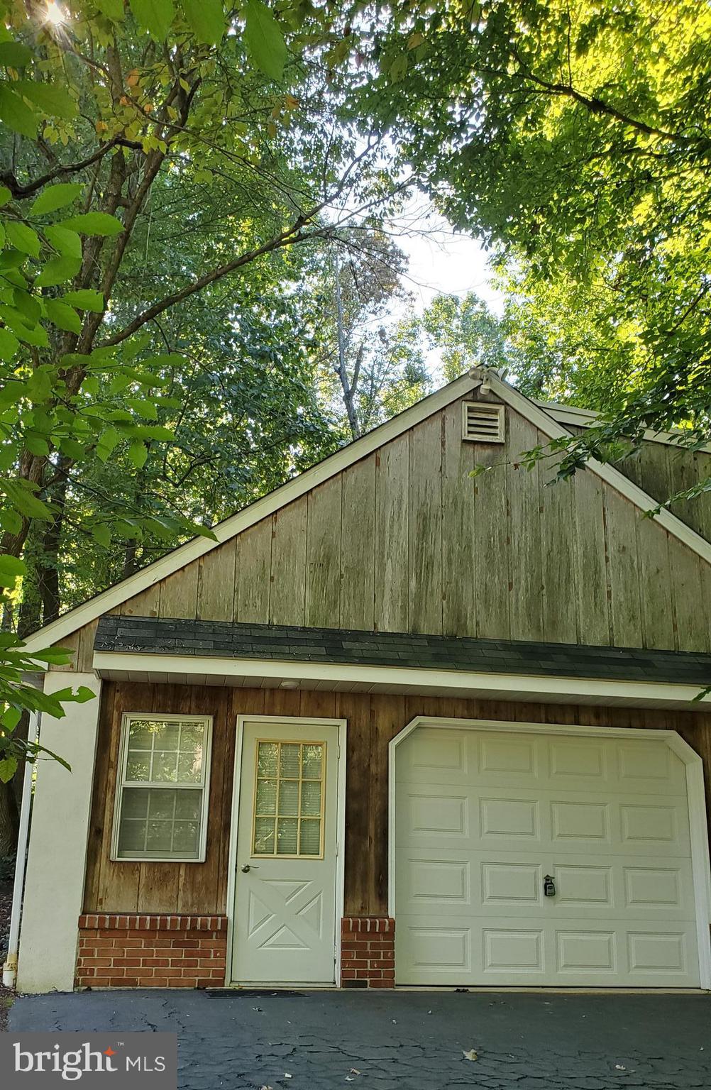 Showings begin June 8.
Discover the perfect blend of comfort and tranquility in this 1-bedroom, 1-bath apartment nestled within a serene, wooded environment. Ideal for nature lovers and those seeking a peaceful retreat, this apartment offers a unique living experience surrounded by lush greenery and the soothing sounds of nature. This impeccably maintained apartment has a private entry and dedicated off street parking spots. Combination kitchen/living area with access to your private deck gives you time to enjoy your morning coffee or unwind in the evening while immersed in nature. Full bath, in-unit washer dryer and carpeted bedroom with large closet. While tucked away in a quiet wooded area, the apartment is conveniently located near essential amenities such as grocery stores, restaurants, & convenience stores with easy access to the turnpike. Sorry, no pets. This 1-bedroom, 1-bath apartment offers a rare opportunity to live in harmony with nature while enjoying modern comforts. Don’t miss the chance to make this peaceful woodland apartment your new home.