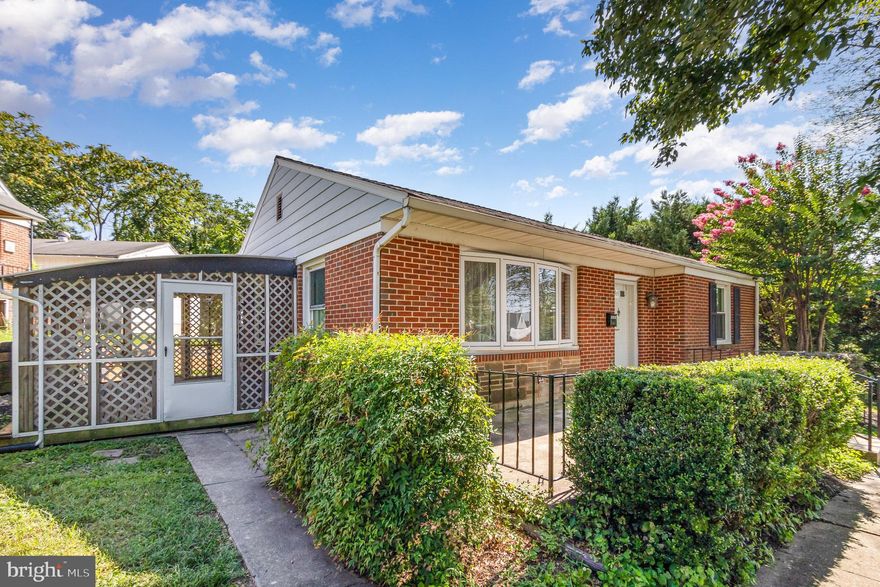 Welcome to one of the sweetest spots in Rosedale—this charming and updated brick rancher sits on a spacious corner lot with beautiful views. Move-in ready, the home offers nearly 2,200 sq ft of living space across the main and lower levels, featuring an additional bedroom, large rec room, and backyard walk-up, along with the convenience of traditional rancher living on the first floor. An enclosed side porch off the kitchen adds flexibility for relaxing or entertaining. The bright, modern kitchen includes updated cabinets, granite countertops, stainless steel appliances, ceramic tile flooring, and recessed lighting. The open living-dining area features refinished hardwood floors, recessed lights, and a large bay window for natural light. The main level offers three true bedrooms with updated laminate flooring and ceiling fans, plus a full bath with ceramic tile tub surround, updated flooring, and a newer vanity. A partially floored, insulated attic provides excellent storage. The finished lower level includes a fourth bedroom, full bath with shower, rec room, and a laundry area with washer/dryer, storage cabinets, and walk-up backyard access. A separate utility room adds more storage. Outdoor features include a front porch, enclosed side porch, and a flat backyard perfect for entertaining or relaxing. System upgrades include a Goodman HVAC (2018), 74-gallon water heater (2021), vinyl double-hung windows, electrical improvements, architectural shingled roof, reinforced retaining wall, sump pump with battery backup, and a one-year home warranty for peace of mind. This home has it all—space, comfort, and modern updates. No HOA. Schedule your showing today!