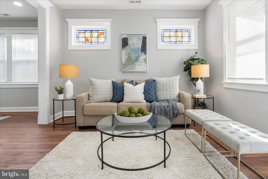 STUNNING Fully Renovated 4 Bedroom, 3 Full Bathroom Home! This Home Offers An Open Floor Plan, Hardwood Floors, A Gorgeous  Kitchen with Stainless Steel Appliances, Custom Tile Backsplash. Granite Countertops, Soft Closing Cabinets & Beautiful White Cabinetry With Access The Back Patio. Continuing Throughout The Main Level Is 2 Spacious Bedrooms With Ample Closet Space Complete With A Full Hallway Bathroom. The Upper Level Offers A Master Suite With Ample Closet Space & Full Bathroom With A Custom Tile Shower.  The Finished Lower Level Provides A  HUGE Family Room with Wall to Wall Carpeting With A 4th Bedroom and Full Bathroom. This Home Is Perfect For Entertaining and More!!