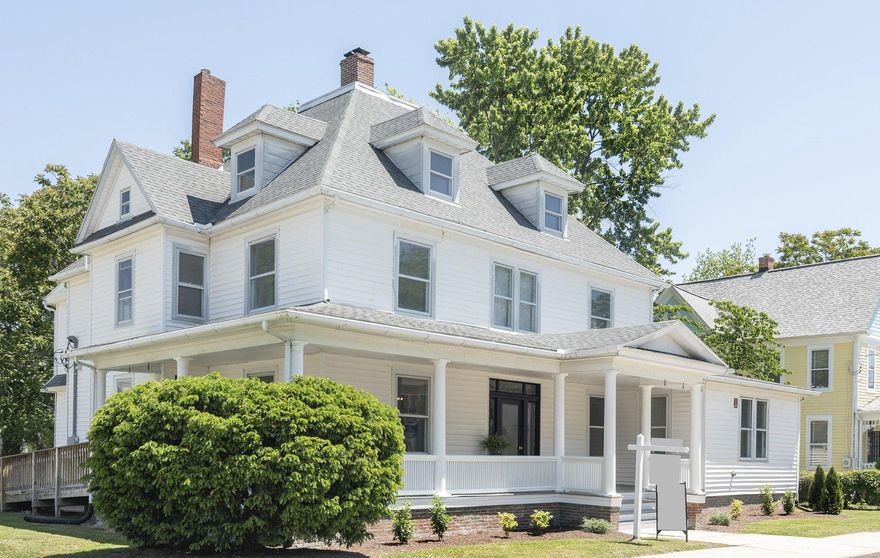 For Sale: a large American Four Square located in the beautiful Cambridge Historic District and situated on a TRIPLE corner lot. Home sits on the corner lot while the backyard consists of two addition lots with potential for division. This home is being carefully improved and restored with care to keep/save: built in cabinetry, millwork, trim, moldings, wainscoting, plinth blocks, windows, glass, pocket doors, doors, balusters, rails, hinges, knobs, architectural radiators, and floors to maintain the character of the 120 plus years old high ceiling home.  On the first-floor modernization includes an all new eat-in island kitchen with walk through cabinetry to bonus room/additional kitchen, an improved parlor/game room, three bedrooms and three new/updated bathrooms. That is three full bathrooms and at least three bedrooms on the first floor!  The westerly side of the first floor offers a wing connecting a primary suite (inclusive of two bathrooms) to a library/office to the parlor and central hall. The back entrance includes a mudroom area with access to a new bathroom and central hallway. The central hall gives access to the front and back of the home, the great room, the parlor, the island kitchen, and the east and west sides of the home. The easterly side of the first floor has two bedrooms and a full bathroom.  Bonus areas exist under the staircases. Spaces (9 rooms) on the second floor include bedrooms and bathrooms that will be ready for your vision with potential for multigenerational living. A bright landing/library with built in bookshelves exist on the second floor as well. The third floor includes a heated living space and storage.  The original staircases consist of a grand front and charming back with hand crafted millwork.  Two historic Rumford corner fireplaces adorn the great room and kitchen.  Original pocket doors separate the foyer and central hallway from the great room with a second set separating the great room from the new kitchen. Freshly painted. Includes a new two zoned central HVAC system along with a high efficiency boiler for hot water and/or radiant heating. The radiant heating can be adjusted for each room. Electric has been updated to 320-amp service.  Home has been rewired. The front entrance doorway has been brought back to the original woodwork with restored leaded glass sidelights and transom lights. The large front and side wrapped porch have been restored and freshly painted.
Off-street access is available to the property from Choptank Avenue where there is room for a "carriage house"/garage -workshop, garden, and potentially a pool. Are you thinking Country Inn or Bed and Breakfast? Plenty of parking if desired. A handicap ramp exists on the westerly side of the home that gives access to the porch and front entrance. There is an existing sprinkler system.
Within blocks is historic downtown shopping and dining, water access, the Cambridge Yacht Club, city marina, and waterfront parks. 
This home is one of the 667 Cambridge contributing properties on the National Historic Registrar.