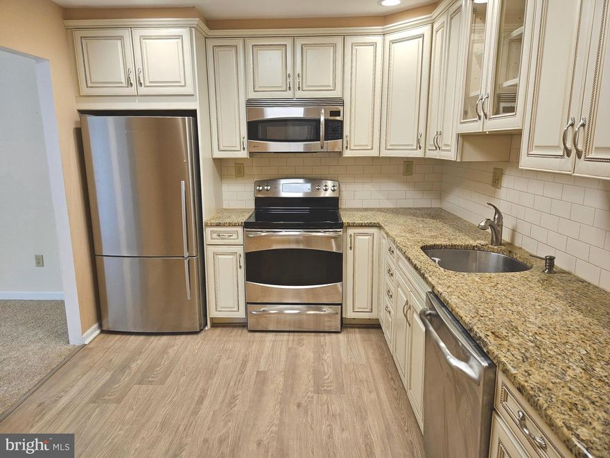 This beautiful unit at Huntingdon Valley's Hill House is one of the largest 2-bedroom, 2-bath models with an extra alcove off the dining area perfect for a home office and in neutral tones throughout. Hill House at Meadowbrook Condominium is a peaceful 3-building community, professionally managed and conveniently located just minutes from great dining, shopping, health care and transportation including a SEPTA line direct to downtown Philly and in walking distance. The unit features an extra-large living and dining area easily partitioned with furnishings, a beautiful and modern kitchen with plenty of upgraded cabinetry and appliances, a spacious master bedroom with a full bathroom and huge walk-in closet, a second bedroom and a hall bathroom, a laundry closet (side-by-side washer and dryer fit fine and are included!), a big pantry / utility closet, a balcony accessed from the living room or alcove, and a first-floor storage cage. All new warranteed carpet and vinyl flooring has been installed ((photos do not do this justice - it's really so nice inside). The buildings and surrounding grounds are well-maintained, and there's plenty of parking for residents and their guests. No rentals, and no pets permitted other than service animals.