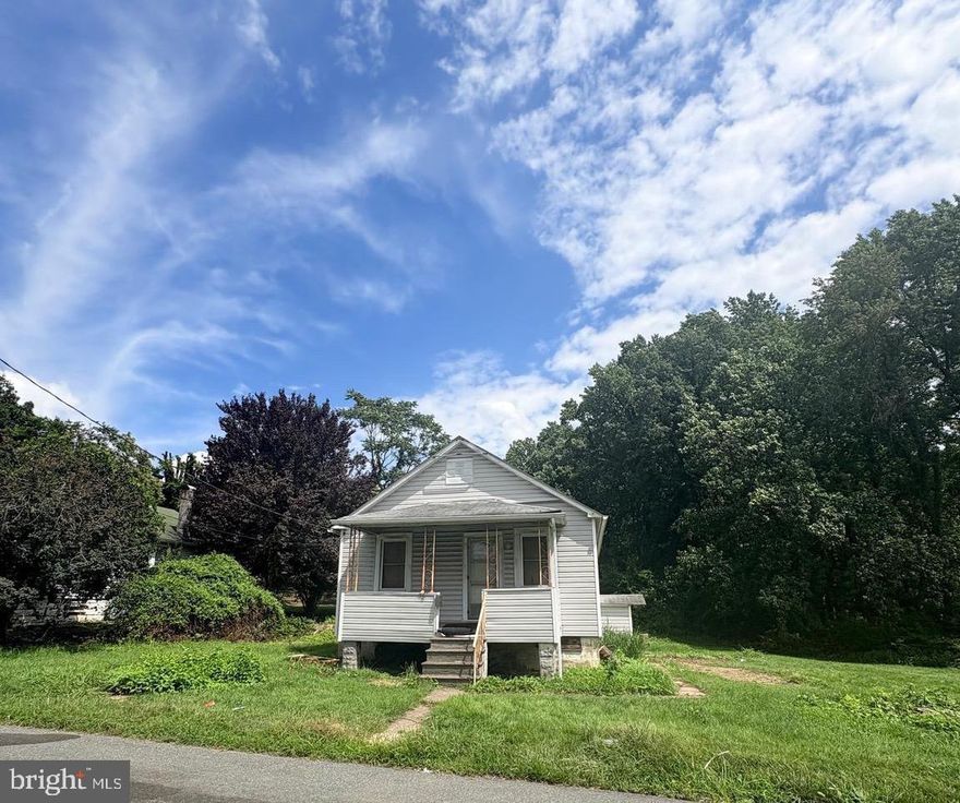Two Lots, Endless Potential! Whether you're restoring the character of the existing structure or starting fresh, this unique property offers flexibility and investment value on a rare double-lot configuration.