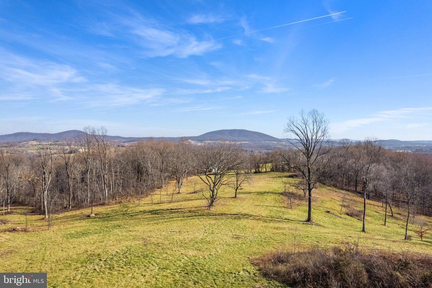 Great opportunity to purchase this stunning 191.5+/- acre piece of land.  With gorgeous views of the valley below and located just minutes from Hume, Va, this property is a true gem. It is comprised of three tax parcels. The land has a wonderful mix of hardwoods and plenty of trails making it an ideal location for a weekend getaway. The property is surrounded by large farms in conservation easement, giving you plenty of privacy while also providing easy access to I-66 and Route 17. The land is in a VOF Easement, please see documents.