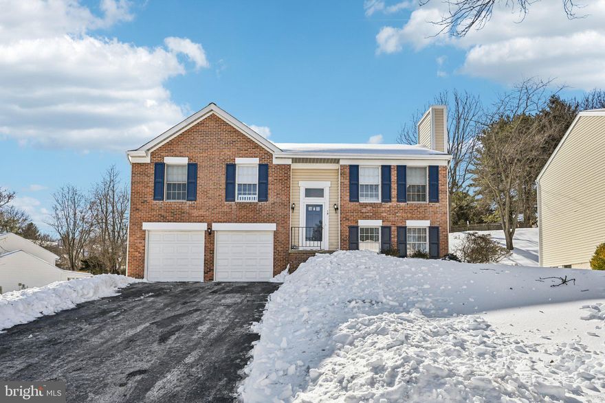 Beautifully renovated split-foyer home in the heart of the Timberscape neighborhood of Owings Mills. Renovated just one year ago, this charming home offers an open floor plan with soaring ceilings in the living room, creating a bright and welcoming space. The updated kitchen features appliances that are only one year old and flows seamlessly into the dining area, perfect for everyday living and entertaining. New flooring runs throughout the home.

The main level includes three nicely sized bedrooms, including a primary bedroom with a private full bath, along with an additional fully renovated hall bathroom. The finished lower level offers a cozy wood-burning fireplace, new flooring, a convenient half bath,  laundry and access to the attached two-car garage.

Sliding doors from the kitchen and dining area lead to a brand-new deck overlooking the backyard—ideal for relaxing or outdoor gatherings. Conveniently located near shopping, dining, and commuter routes, this move-in-ready home is a must-see.