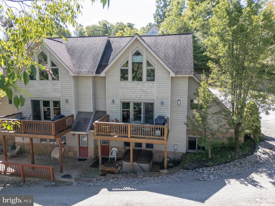 Looking for an updated condo at Deep Creek Lake? Look no further! 256 Jeffrey Lane #28 is a 3BR/3.5BA condo at Traders Landing offering lake views just across the street from the lake. Centrally located, you can be at most area amenities within minutes from your front door. Northern exposure makes for great all day sun. Recent improvements include renovated kitchen, bathrooms and furnishings. Established vacation rental. These units don't come on the market often.  Call to schedule a private showing today!