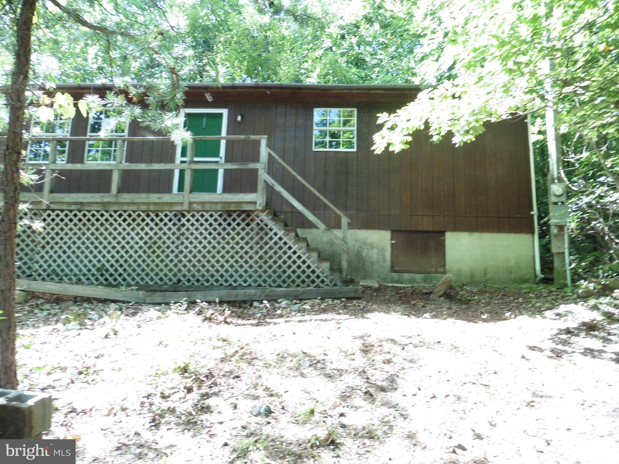 Privacy and seclusion. Cozy cabin on the ridge. Get away from it all with 6+/- acres of hiking, wildlife watching and peace. Decks, wood stove with wood. Access to Sleepy Creek Hunting and Fishing area. Freddie Mac First Look Initiative until 10/23/2017. Seller paid Home Warranty up to $500 for owner occupant buyers. Sold As-Is.