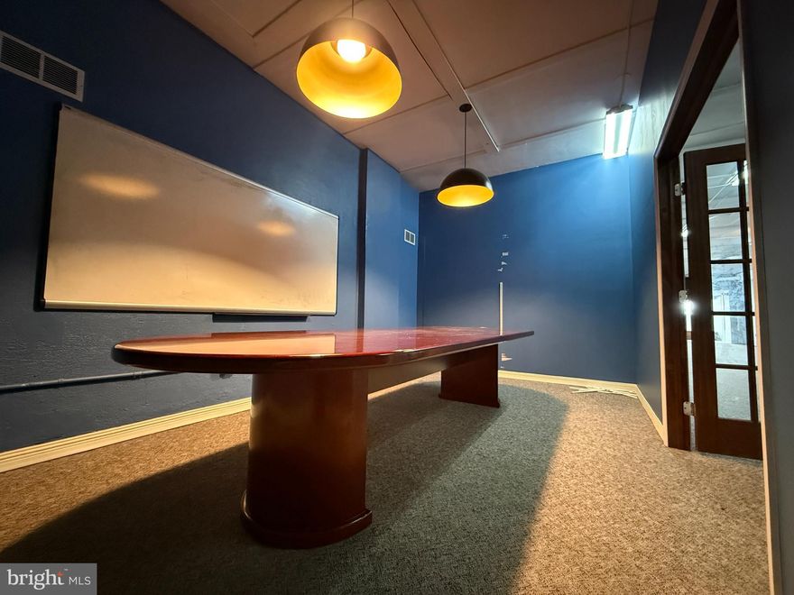 3,550 SF | High-Traffic Location | $2,400/mo

Looking for the perfect downtown commercial space in Front Royal? This spacious 3,550 SF property on East Main Street offers excellent visibility, ample room for customization, and unbeatable affordability at only $2,400 per month. Situated in a high-traffic area, this property is ideal for retail, office, or service-based businesses looking to establish themselves in a thriving, walkable downtown community.

Property Highlights:
✅ Prime Location – Right on Main Street, adjacent to Royal Cinemas, ensuring steady foot traffic
✅ Expansive Layout – Large open space with private offices or storage areas
✅ Two Handicap-Accessible Bathrooms
✅ Central HVAC 
✅ On-Street Parking + Additional Rental Spaces Nearby
✅ Utilities Separate for tenant control over expenses

Perfect for a Variety of Businesses:
Professional Offices – Law firms, real estate agencies, accounting firms, consulting firms

Medical/Wellness Practices – Chiropractic, physical therapy, massage therapy, counseling centers

Retail & Boutique Shops – Clothing, home décor, specialty goods, artisan crafts

Fitness & Training Studios – Yoga, pilates, personal training, dance studios

Creative & Co-Working Spaces – Marketing agencies, photography studios, tech startups

Education & Tutoring Centers – Test prep, music lessons, daycare facilities

Cafés, Juice Bars, or Small Restaurants – Smoothie bars, coffee shops, healthy eateries

Service-Based Businesses – Insurance agencies, travel agencies, beauty salons, nail spas

Why This Space?
At only $0.68 per SF, this is one of the best commercial deals in town! With ample space, a prime downtown location, and flexible business use options, this is your chance to set up shop in one of Front Royal’s most visible and bustling areas.

Establish your business in the heart of Front Royal’s Technology Zone and benefit from exclusive tax incentives, including up to a 100% reduction in BPOL taxes for five years. (see document in MLSDOCS for more explanation of the three simple requirements any business can do to take advantage of this tax deduction)