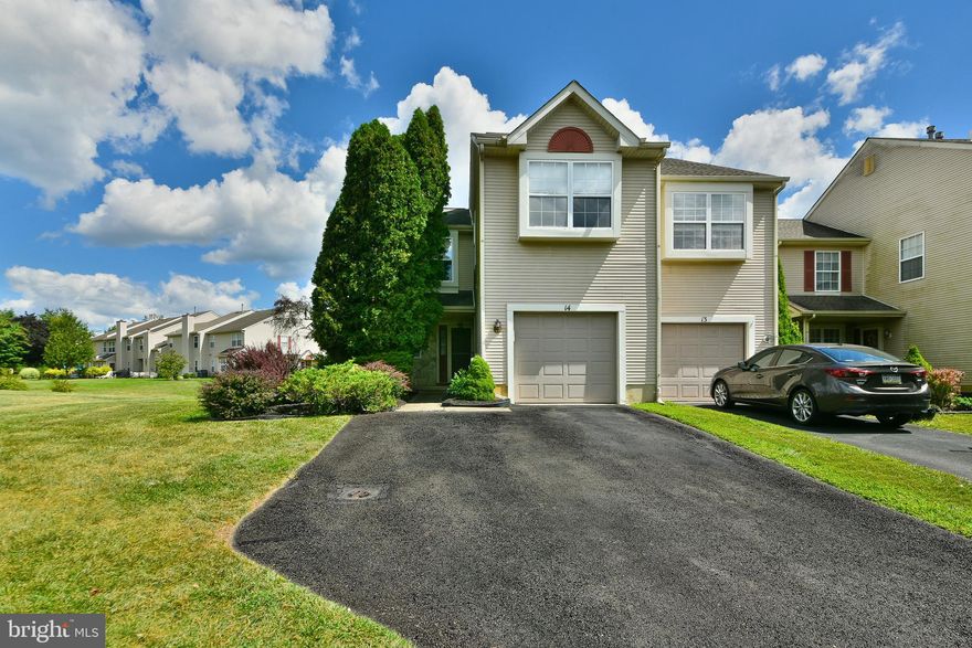 Welcome to 14 Nutmeg Place in the desirable Newtown Grant community, located in the Council Rock School District.  This 3 bedroom, 2.5 bath end unit townhome offers a bright and open two story layout with vaulted ceilings, skylights, and great natural light throughout the main living space. 
The family room features a fireplace and flows into the dining area with sliding doors leading to the backyard. The kitchen offers a functional layout with plenty of cabinet space and easy access to the main living areas. The second floor includes a spacious primary bedroom, a second bedroom, and a versatile loft area that works well as a home office, second living space, or flex area. 
Additional features include a one car garage, private driveway, and in unit laundry.  The end unit location provides extra space and a more open outdoor setting. Conveniently located near shopping, dining, and major commuter routes.  
The HOA provides access to amenities including a relaxing in-ground pool, tennis courts, pickleball courts, and a clubhouse. Great price for Newtown Grant and a solid opportunity to get into this highly sought after neighborhood.