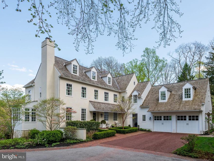 4 Brook Lane is located in an extraordinarily private location and yet only minutes from the town of Paoli. Boasting 6 bedrooms is this charming, comfortable, warm and meticulously maintained modern farmhouse style home with hardwood floors, crown moldings, tall ceiling and large windows. Designed with an open floor plan for today's modern lifestyle. Enter through the front door and be immediately impressed with the craftsmanship and attention to detail.  A music room with fireplace and a wonderfully light den are to the left, to the right is the dining area and well proportioned large kitchen with high end appliances (Sub-Zero with wood panelling and Miele appliance), center island with seating, and a view over the back patio. An additional kitchen table occupies an area with amazing views and exits to the back flagstone patio, and leads to the family room with cathedral ceiling, exposed beams, french doors and fireplace. Ample room for the most discerning buyers. The first floor is completed with a brick floored mudroom with cubbies, pantry with second fridge, garage entrance via breezeway, back stair cases and 2 half baths. Ascend the front-hall staircase to the primary suite, with crown molding and large windows.  The suite comprises of a sitting area, build in closets, upscale bath with walk in shower and a dressing room with ample additional closet space. The second bedroom is ensuite and has a wonderful view of the back yard.  The second floor has its own laundry room, back stair, hall bath, the third bedroom and finished room over the garage, perfect for  the home office. The third floor is well appointed with 2 dormered charming bedrooms, a shared hall bath and an efficient laundry closet.  The lower level has a sixth bedroom ensuite and is walkout. Additionally there is a sitting area perfect for casual tv or game time, a gym area and a carpeted bonus space.
The outdoor space does not disappoint! Masterfully planned perennial gardens for flowering plants to transitions between seasons, the focal point is the expansive flagstone patio and lighted koi pond with elevation perfect for longer views across the lawn and down to the creek over to the protection of the woodlands. This area has a built in Wold gas grille with Perlick beverage fridge for outdoor entertaining.
The two car garage creates a portion of the entryway courtyard and is oversized for extra storage! 
The Heated four car garage includes a ski and bike storage room and walkup stairs to the second floor.  A top of the line Vector Security system including cameras was installed in 2022.  Out door lighting,  invisible dog fence, graded level play area lawn, raised vegetable beds,  generator complete the property. Wildlife also abounds in this dead end private street location. The property abuts Waynesborough County Club beyond the woods. Close to all the Main Line has to offer (shopping, excellent public and private schools, transportation - Amtrak and Septa) as well as the rural open spaces that Willistown Twp. is so notably known for preserving. The 80 acre Kirkwood Preserve is a few minutes drive.