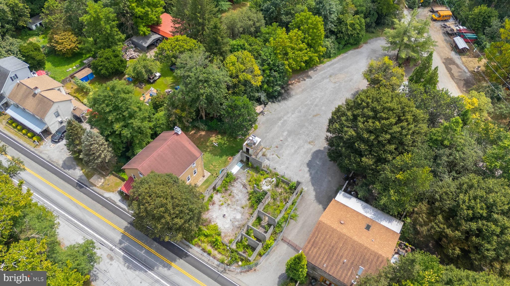 Imagine the Possibilities in Charming Mortonville
Set in the historic and picturesque hamlet of Mortonville in Newlin Township, this unique package of four contiguous properties offers an extraordinary opportunity for visionary commercial or mixed-use redevelopment. Listed at a combined $750,000, the offering includes both land and structures across a total of approximately 2.05 acres with varied zoning and flexible potential.
Anchoring the portfolio is 2094 Strasburg Road (Tax ID: 49-01-0010), the storied site of the former Dugals Inn. Zoned FRD – Flexible Rural Development, with an added Village Overlay District, this parcel spans 0.1899 acres and holds deep potential for revitalization into a community favorite—think a destination restaurant, craft brewery, or country-style retail space.
Adjacent is a spacious, paved parking lot (Tax ID: 49-01-012), comprising 1.5545 acres of level ground. Zoned V10 this lot allows for ample customer parking, outdoor seating or event staging space, and future auxiliary development.
Also included is a twin residential dwelling at 2090 & 2092 Strasburg Rd (Tax ID: 49-01-0009.0100), offering 0.1976 acres of R10-zoned property. This twin house could serve as rental income, live/work accommodations, or even short-term lodging—adding critical value to your investment.
Rounding out the package is a second paved lot across the street at 2089 Strasburg Rd (Tax ID: 49-01-0001.0100), adding another 0.1112 acres of usable land, also zoned V10.
Key infrastructure updates include an approved sewer permit for the twin home parcel, with pump-and-haul capability planned for redevelopment on the former Dugals Inn site. Two well-positioned parking lots—one in the rear and one across the road—make it feasible to accommodate both guests and staff.
With steady traffic along Strasburg Road and flexible zoning, this offering is a blank canvas for a thoughtful developer, business owner, or investor to craft a vibrant new destination in scenic Chester County.
