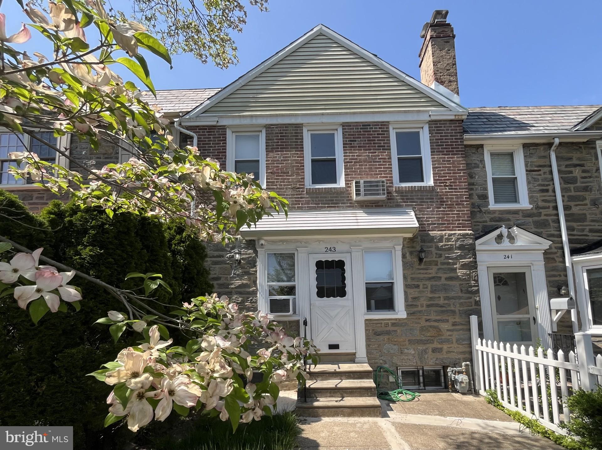 A charming row home on a lovely, tree-lined street in Lower Merion! The spacious living room features a wood burning fireplace and plenty of space for entertaining. There is a dining room between the living room and bright, white kitchen with plenty of storage. Upstairs you'll find three generously sized bedrooms and an updated full bathroom featuring a shower and a tub. The finished basement offers more living space as well as a powder room and washer/dryer. Enjoy the convenience of your own garage with a driveway out back. This sun-filled home has hardwood floors throughout, original moldings and loads of character. Easy walking distance to shops, restaurants, public transportation and park.