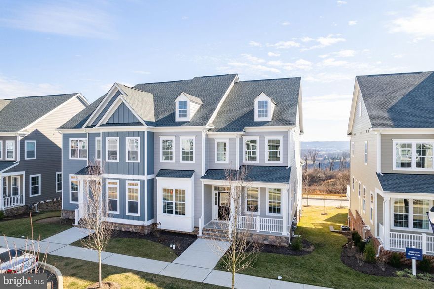 This stunning home will instantly excite you as you walk through your new front door experiencing the dramatic entrance showcasing true open concept living. Magnified with an epicurean eat-in massive island and butlers pantry that flows right into your great room perfectly designed for entertaining. And, when you need more space, head down to your partially finished basement fit for any king, queen, prince or princess. With enough space for everyone and everything, the customizations are waiting for what meets your needs. The second floor boasts 4 spacious bedrooms including your heavenly master suite. With two generous walk-in closets and an en suite with soaking tub and separate stall shower, this room is truly a retreat from the everyday. This home also offers a first floor guest suites. With a truly maintenance free living lifestyle, the Traditional Neighborhood Development (TND) promotes a sense of community not usually experienced in today's suburban developments. Spring Oak offers carefree living that has something for everyone; swimming pool, fitness center, walking trails, basketball court, bocce ball, community garden and state-of-the-art clubhouse. The design center has a beautiful display of these high ended selected finishes; such as Hardie Plank siding on all sides and real window shutters. Photos may vary from home. This home is available for end of year delivery.

Photos may vary from home. Price is based on time of deposit and contract within the required period of time. Prices and terms of the sale subject to change without notice.