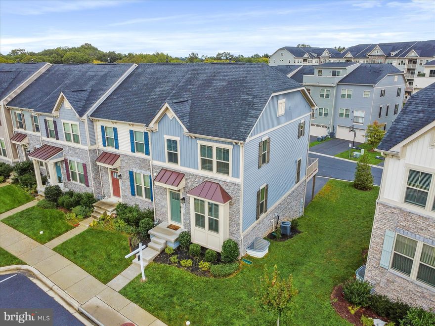 Nestled in the desirable Lake Linganore Town Center, this exquisite end unit townhouse combines modern elegance with functional design. Step inside to discover an open floor plan adorned with luxury vinyl plank flooring, crown moldings, and abundant natural light from bay windows. The kitchen is  equipped with stainless steel appliances, a gas range, and an island perfect for entertaining. Retreat to the spacious primary suite, complete with a walk-in closet and a luxurious bathroom featuring both a walk-in shower and a soaking tub. The community offers unparalleled amenities, including a pool, beach access, and recreational facilities. With easy access to Lake Linganore for kayaking and fishing, this home is a perfect blend of luxury and lifestyle. Don’t miss this opportunity!