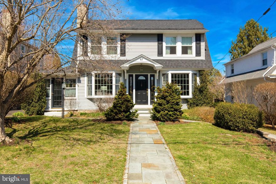 Charm abounds inside this beautifully maintained home in the heart of Flourtown.  Step inside and be greeted by an abundance of natural light streaming through large bay windows, illuminating the inviting entryway. A handsome brick fireplace serves as the heart of the living room, complemented by extensive millwork that adds timeless character throughout.
The sunroom with its own outdoor access offers the perfect retreat for morning coffee. The formal dining room, accented by elegant pony walls seamlessly connects to the spacious family room through classic French doors—ideal for both intimate dinners and lively gatherings.
The kitchen is truly an entertainer’s dream! Featuring quartz countertops, a subway tile backsplash, and a generous breakfast bar, this space is designed for effortless hosting. The breakfast area, with its charming shuttered windows, overlooks the backyard and provides direct access to the rear deck —perfect for indoor-outdoor living. The family room is equally inviting, with windows that frame serene views of the lush gardens.
Ascend to the second level to discover three generously sized bedrooms, all with ample closet space and beautiful hardwood floors. The full bath offers built-in storage and a single vanity; while the spacious primary suite is a true sanctuary, boasting two large closets and an en-suite bath with a double vanity, granite countertops, a stall shower, and a built-in linen closet. Adding to the home’s convenience, a tiled laundry room is tucked away just off the primary bath.
With a versatile floor plan, timeless design elements, and a prime Flourtown location near shopping, parks, and major travel routes, 47 Grove Avenue is a must-see! Located in the highly acclaimed Springfield Township School District. Schedule your showing today and experience the perfect blend of charm and modern living.