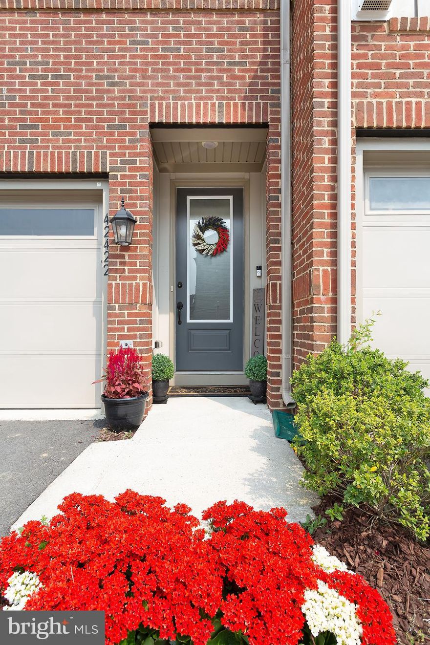 Don't miss this AMAZING less than 5 years young gorgeous townhouse with many upgrades! 3+ Bedroom, 3 Full and 1 half Bathroom, 2 car garage in sought after Stone Ridge Community. The large open living and dining rooms and kitchen are great for entertaining space. There are loads of windows to let in natural light.  The Gourmet Kitchen is upgraded with Large Granite Island Countertops, Stainless Steel Appliances and a 5-burner gas stove. Hardwood Flooring on both staircases and the main level. There is also a half bath which completes the main level.  Huge Owner's Suite with Tray Ceiling, Large Walk-in Closet, Spacious Shower in the Owner's Bath with Granite Countertops and Double Vanities. Each room of the home is wired with RJ45 jacks. Two bedrooms have ceiling fans but both the breakfast nook and dining room are wired for ceiling fans. The laundry closet has a full size washer dryer. The lower level (entry level) has a large recreation room with a corner gas fireplace with enough space for an additional bedroom if desired, with access to the fully fenced rear yard.  Extra large deck  off of the kitchen with gas hook up for grilling! Recessed lighting throughout. Whole home humidifier and attic fans are a bonus! Lots of windows and natural light!  Close to shopping, restaurants, airport, wineries, Stone Springs Hospital and commuter routes. Be Ready! This one won't last!