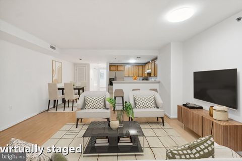 Photo of 7981 Eastern Ave NW #204, SILVER SPRING, MD 20910 (MLS # MDMC2207268)