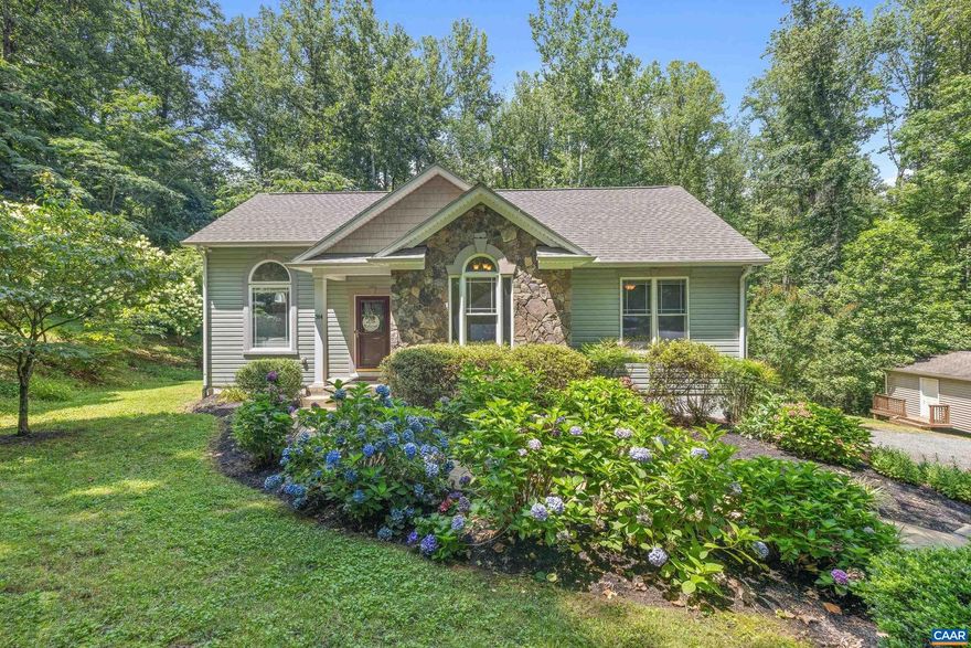 Welcome to your dream retreat located in a quiet lake community near the Blue Ridge Mountains. This beautifully updated three bedroom, three bathroom one-level home with a full basement and oversized side-load garage shines like new from the moment you step inside. Bamboo wood floors in the living areas lead to a lovely kitchen boasting white cabinets, granite counters and stainless steel appliances. 9' and 10' ceilings throughout with an upgraded trim package, Sante Fe interior doors, crown moulding, architectural arches, and built-ins that add charm and character in all the right places. The true primary suite is a standout?featuring a tray ceiling with lighting, a built-in desk area, and a spa-like en suite with vaulted ceilings and an oversized tub. Cozy up by the gas fireplace, entertain on the Trex deck, or take in the quiet beauty of your private backyard. This home checks all the boxes!,Granite Counter,Wood Cabinets,Fireplace in Living Room