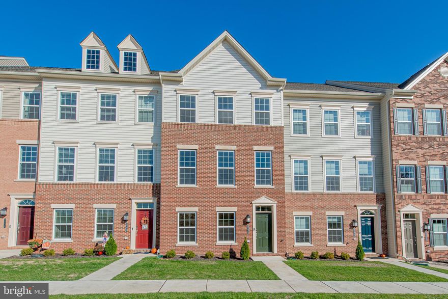 FINAL OPPORTUNITY FOR YEAR END SAVINGS!   ROOF DECK!!!  AMAZING New Home at an AMAZING New Price. This urban contemporary design features a beautiful foyer that opens to finished recreation room with half bath. The main level has and expansive great room that serves as dining and living room space.  The lavish third floor includes a stunning owner's suite with sizable walk-in closet and owner's bath with dual vanity and separate shower.  Roomy secondary bedrooms share full bathroom and neighboring laundry area.  EVERYTHING'S INCLUDED.