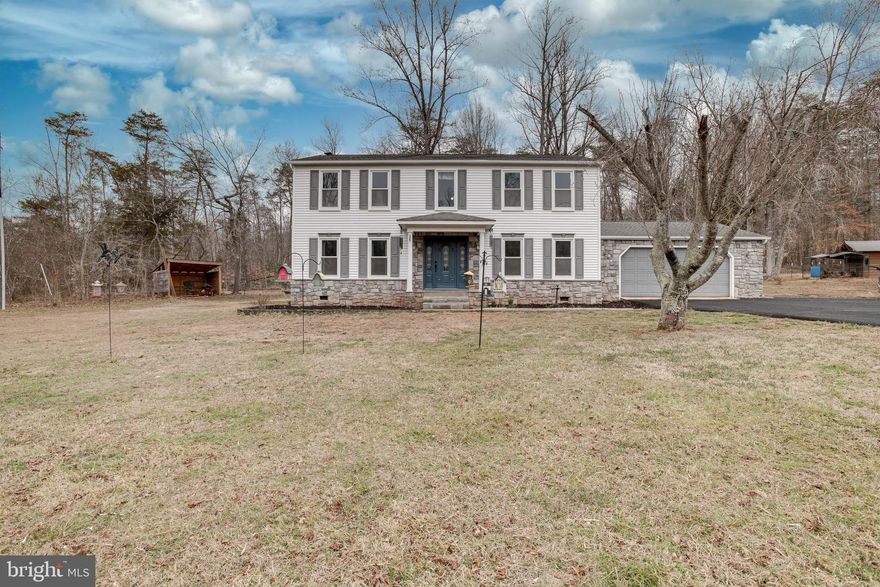 Welcome home to this stunning Colonial retreat tucked away in the peaceful community of Cedar Run Estates, where privacy, charm, and space come together on just over five beautiful acres of agriculturally zoned land.

This immaculately maintained four-bedroom home blends timeless elegance with warm, comfortable living. From the moment you step inside, you’ll be drawn to the gorgeous Brazilian cherry hardwood flooring that flows throughout the home, beautifully complemented by crown molding, chair rail, and picture frame molding that add classic character and detail.

The spacious kitchen overlooks the inviting family room/dining room, creating a natural gathering space perfect for everyday living or entertaining guests. As the seasons change, you’ll love cozying up by the wood-burning stove, bringing the perfect touch of warmth and ambiance to fall and winter evenings.

Upstairs, the home offers a generous primary suite along with three additional spacious bedrooms, providing plenty of room for family or guests.

Step outside and experience everything this property was designed to offer. With just over five private acres, there is endless space to enjoy the outdoors, host gatherings, and take in the peaceful surroundings and abundant wildlife. The newly added deck and charming gazebo in 2025 create the perfect setting for summer cookouts, entertaining friends, or simply relaxing and enjoying the beauty of nature.

This property continues to impress with incredible versatility and functionality, including an additional  large steel garage building added in 2023, a shed with electricity, and even an RV hookup—making it ideal for hobbyists, outdoor enthusiasts, or anyone needing extra work space or for equipment and storage.

This beautiful property truly offers the perfect balance of elegance, comfort, and country living, making it a rare opportunity to own a private retreat that feels like home the moment you arrive.