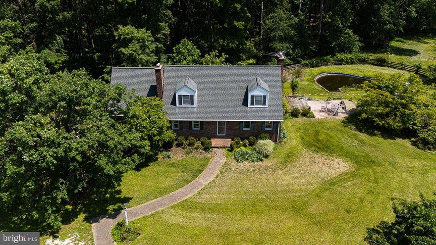 3 LOTS 7+ Acres!!! 
Charming All-Brick Cape Cod in the Heart of the Hereford Zone. 
Spacious Living with Modern Updates and Tranquil Views,  
Discover the perfect blend of classic charm and modern convenience in this all-brick Cape Cod located in the sought-after Hereford Zone. This 3-bedroom, 2-bath home is a offering thoughtful updates and serene surroundings.
Main Level Elegance
Step inside and be greeted by the warmth of beautiful hardwood flooring that extends throughout the entire main level. The living room features a cozy fireplace flanked by built-ins perfect for displaying treasured books or decor. The updated kitchen boasts modern finishes, creating a functional and inviting space for culinary endeavors. Adjacent to the Dining area, a huge sunroom that offers a breathtaking view of the pool, making it an ideal spot for relaxation or entertaining guests.
Upper-Level Retreat
The upper level provides privacy and ample space with two generously sized bedrooms. Each room is designed with comfort in mind, featuring abundant natural light and storage. A full bath on this level has been updated to reflect a contemporary aesthetic, ensuring convenience and style.
Outdoor Living
The exterior of the home is equally impressive. The sunroom opens up to a view of the pool, creating a seamless indoor-outdoor living experience. Whether you’re hosting summer gatherings or enjoying a quiet evening by the water, the outdoor space is perfect for making cherished memories.
Why Choose This Home?
Nestled in the Hereford Zone, this property offers the tranquility of suburban living while being accessible to nearby amenities. Its classic Cape Cod architecture, combined with thoughtful updates and a versatile layout, makes it a true gem.
Don’t miss the opportunity to make this property your own. Schedule a tour today and experience all the charm and comfort this home has to offer. Home being sold as-is, some repairs needed.
All 3 Lots are included which is an additional over an additional 1.2+ Acres (see docs)