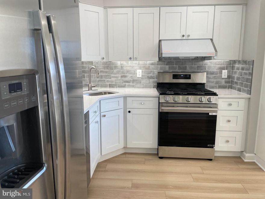 Welcome to 828S a gorgeously renovated corner 2 bedroom, 1 bath apartment in the prestigious Promenade Towers.  Being a corner unit, there is double the exposure from two walls of oversized windows, an extra large balcony, bathroom and primary bedroom closet.    The kitchen has all new stainless appliances except the refrigerator which is in fine condition.    During the renovation, the kitchen was opened to the living room with a large pass through and granite counter.  Plenty of cabinets including a wine rack.  The floors throughout are luxurious, carefree, vinyl wood-grain wide planks.  The ceiling throughout the apartment has been remediated of asbestos and is smooth with lots of recessed lights.  Beautiful grey railroad backsplash. 
The bathroom has a walk-in shower with both fixed and hand held shower heads.  Large sink cabinet with plenty of storage and a lit mirror above the sink.   Both bedrooms are spacious and offer great views.  Wonderful views from all the windows.  One garage space conveys. The building has so many amenities, it lives like a resort. The lobby is in the process of a complete renovation.   The recently redecorated Arcade level has the state of the art fitness center with indoor pool and hot tub: locker rooms with showers and sauna.  Also in the Arcade is Chef Tony’s restaurant (a well known seafood/Italian eatery), a grocery store/deli, dry cleaners, travel agent, beauty salon, resident lounge, party and conference rooms.  There is a large outdoor pool with adjacent grills.  Tennis (lighted courts) and pickelball have their own building as you drive onto the property.  Ping pong is played regularly, as are social activities such as “Breakfast at Wimbleton”.  There are too many activities to mention them all.  A few are …trivia night, open mike night, monthly first fun movies, lectures, vaccinations, vote in all elections in the party room (including Presidential).  There is meditation, exercise class, book club, canasta, bridge, and mahjong.  We have wine and cheese get togethers in the lobby, a rocking New Year’s Eve party and various other celebrations.  We have car charging stations, and a car washing area with a dynamite vacuum.  Garage parking comes with the unit.  It is easy to get to the Red Line Medical Center metro stop at NIH/Walter Reed.  The bus comes to the door of the Promenade.  Close to 495 and 270.  Nearby Wildwood Shopping Center has Balduccis, CVS, Bethesda Bagels, Starbucks, a number of places to eat and several cute boutiques.  Giant food is just across the street.