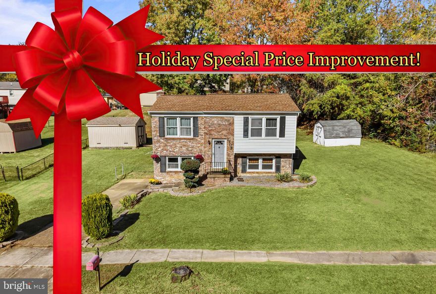 Big price improvement-- just in time for the holidays!  Do you dream of finding an AFFORDABLE home offering PEACE AND QUIET and a LARGE LOT, in a well-kept neighborhood with a "country feel",  tucked away from the hustle and bustle,  but still CLOSE TO EVERYTHING in sought-after Fort Washington? Then you’ll LOVE this CHARMING SPLIT FOYER HOME! With brand-new LUXURY VINYL PLANK flooring on the lower level and PLUSH NEW CARPETING upstairs, this WELL-MAINTAINED home is MOVE-IN READY! ** With its unique layout that flows more like a traditional two-story  home,  you’ll find the SPACIOUS LIVING AREAS on the  GARDEN-LEVEL  FIRST  FLOOR  and the THREE LARGE BEDROOMS UPSTAIRS. ** The formal  ENTRY FOYER welcomes you in at the mid-level,  and from there you'll step down a short half-flight of stairs to the SUNNY LIVING ROOM featuring a cozy FIREPLACE framed by a beautifully carved mantel set against the beautiful "antique white-wash look"  brick wall.  A convenient side entry door opens directly from the living room to the driveway—perfect for bringing in groceries or welcoming guests.  **  The well-appointed KITCHEN offers tall maple cabinets with designer features,  generous counter space, and newer STAINLESS STEEL appliances, including a BRAND-NEW REFRIGERATOR!  A  newer front-load washer and dryer set,  is tucked into an alcove closet. **  The adjacent  SPACIOUS DINING ROOM offers plenty of natural light and  ample room  for comfortable entertaining, or could easily double as a HOME OFFICE.**
Upstairs, the PRIMARY SUITE is impressively large, with room for a king-sized bed AND a sitting area, along with a private ENSUITE BATH!  The two additional bedrooms are also spacious and share a full hall bathroom.**  Outside, the EXTRA-WIDE LOT provides both privacy from neighbors and  room to expand—perhaps even adding a GARAGE in the future?  Two large GARDEN SHEDS, one with ELECTRICITY, provide excellent storage or workshop options.   **  Additional highlights include a newer ROOF (2020) and HVAC system (2015), offering peace of mind for years to come.   **  Set in a tranquil community surrounded by scenic wooded parkland, with homes spaced well apart yet still  located close to DC, National Harbor, and Joint Base Andrews, this property offers a PEACEFUL RETREAT with the best of both worlds! Mortgage savings may be available for buyers of this listing! Don’t miss your chance to make this wonderful home your own—schedule your tour today!