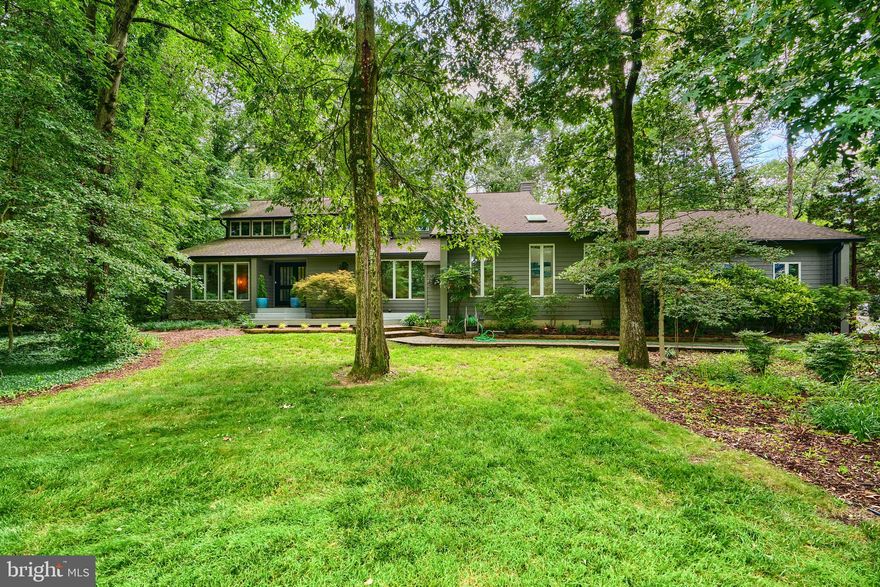 Welcome to 449 Braewood Way. This hidden paradise is nestled on just under one acre, in the heart of Severna Park.  Stunning Contemporary that has been perfectly ungraded to compliment today's lifestyle.  The Amazing Open Floor plan /kitchen, dinning room and family room w/fireplace opens to a large deck over looking the beautiful private landscaped lot. Designer Kitchen is complemented with Thermadore  ( wine chiller )appliances to enhance the  finest Chef . Additionally on the first level you will find laundry, den/office and private fully independent in-law apartment. Upper level includes primary bedroom w/ deck overlooking private yard. Two additional bedrooms and convenient storage. Lower level features finished recreation room along with huge storage area. All this in the Rivendell community with easy  walking distance  to schools, water launch and shopping.