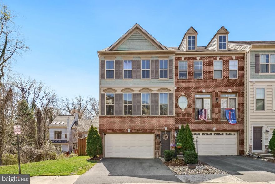 Meticulous end unit town home ideally located in Occoquan.  This home is close to I95, commuter parking, Express lanes and much more.  This home has lots of upgrades and shows beautifully. Walk in through the front door to the foyer stairs leading to the main level boasting upgraded chefs gourmet kitchen with stainless steel appliances, oversized center island, cooktop with double oven, 42" cabinets, pantry, sun filled formal dining room, gas fireplace place with mantle in the welcoming family room that leads to the oversized composite  deck with gazebo. The lower level has 4th bedroom, full bath with upgraded ceramic tile, rec room leading to the garage or the rear fully fenced yard with stamped concrete patio.  Upper level with primary bedroom suite has walk-in closet with built-ins, luxury fully bath with double vanity, soaking tub, separate shower and upgraded ceramic tile.  Continue down the hall to the upper level laundry, addiontal bedrooms and additional full bath.  The home also features 2 piece crown moldings, wood blinds throughout, 9' ceilings, lvp flooring on the main and lower levels, central vacuum, 2 car garage with storage, partially brick front and so much more.  You truly don't want to miss this one. All offers are due Saturday, April 5, 2025  at 9:00pm