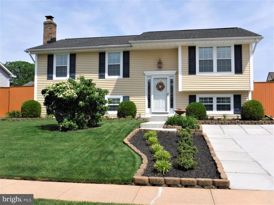 Multiple offers!  Highest & Best on Monday, 6/5 @ 4 pm.  This Beautiful Home has Everything that you are looking for including gorgeous yard with 2 big sheds, additional storage, siding in 2010 w/additional insulation added, windows in 2012, Hot tub with arbor, Large covered deck with vinyl & composite decking.   The inside shows beautifully also with  3 Bedrooms upstairs and 2 more in the lower level.  Kitchen has 42" walnut cabinets with crown molding, laminate wood floor through kitchen & living room & vaulted ceiling, Large island with lots of storage, 2 pantries & coffee bar, window over sink with plantation shutter, Pella French Door with blinds, drawers are self closing.  Brick fireplace in the family room with a pellet stove insert & surround sound (speakers & receivers included); Treadmill in lower level stays.  Laundry room has washer/dryer & laundry sink, sump pump, & storage.  There is only 1 way to enter this development (Theresa Ave).  All courts & dead end streets.  Located next to Kenwood High School's tennis courts.  Sellers are offering a 1 year First American Home Warranty (Eagle Premier) for the Buyer(s) at settlement.  Make your appointment today!!!