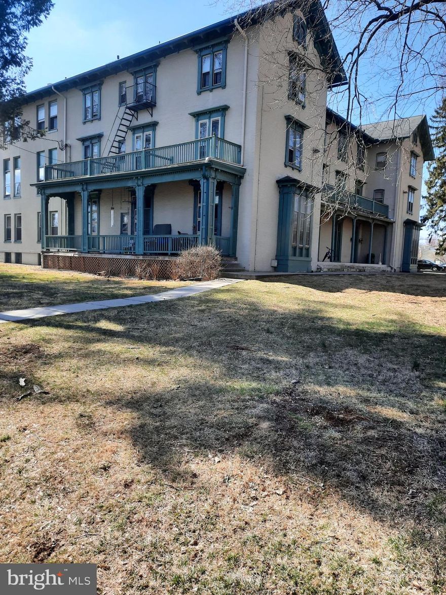 Third floor one bedroom apartment in the Old Irving College building.