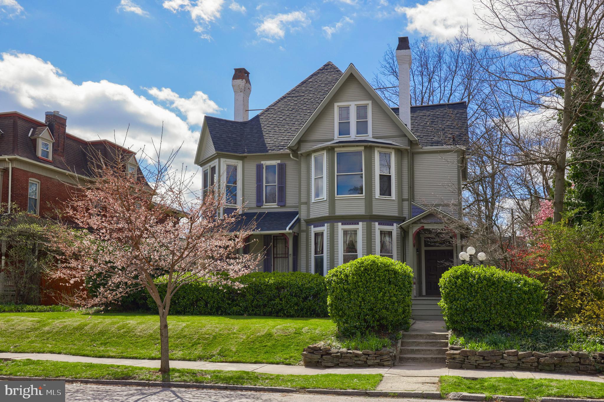 Step into the charm of yesteryear with this 1886 Queen Anne Victorian home.  Offering 6 bedrooms with a potential 7th or bonus room, along with 3 and a half baths, this home seamlessly blends timeless elegance with modern comforts. Features include modern bathrooms, main level laundry room, a butler's pantry, a rear staircase, updated electric, dual zone heating and air conditioning and a new roof. It’s the iconic architecture, the gable roof, scalloped siding and asymmetrical rear of the home and bay windows that make 420 Roosevelt Avenue the epitome of Victorian architecture. The curb appeal is unlike any traditional home built today. There is a long lead walk to the front door that leads you to a 6’ x 15’ porch that takes you in through double doors into a 9 x6 vestibule that leads to a second set of double doors leading into a sprawling foyer with a 20’ high two-story ceiling. The herringbone hardwood floors throughout, the wood stairs with a monkey tail railing, trimmed windows & doorways with rosettes and the radius trim detail and arches will have you realizing you just walked back into a bygone era when the term cookie cutter home did not exist.  Imagine the cost to build a home like this today? The main level has 10-foot ceilings and features a spacious family room with bay windows, a library adorned with built-in shelves and a Franklin wood stove with gas logs. A generously sized dining area offers flexibility, with a a large box bay window and a niche perfect for a buffet or hutch, or the option to embrace the modern open shelf concept. Completing the main level is a Butler’s pantry, powder room, and a conveniently located laundry area adjacent to the kitchen. 
The kitchen features plenty of wood cabinets, drawers and counter space for the chef who loves to entertain, double wall oven, smooth top electric cooktop, dishwasher, real butcher block countertops that have built-in shelves and built-in cutting boards that pull out and slide back for convenience. The brick tiled kitchen plays homage to the Victorian style, as well as the rear staircase that leads to the second floor that also has 10’ ceilings. This level has four bedrooms and two full baths. These generously proportioned bedrooms have solid hardwood floors, walk-in closets with built-in chest of drawers, and big, beautiful windows. The third level features new carpet, two nice sized bedrooms, one of which has a bonus room off of it that could be a 7th bedroom, an office or playroom with a walk-in closet with built in chest of drawers and a full bath with a claw foot tub.
Step outside to discover a fully fenced backyard, thoughtfully landscaped for privacy, with additional space for activities like volleyball, cornhole or even a swimming pool. A charming brick gazebo awaits just off the patio, complete with slate floors, a ceiling fan, and electricity. For added convenience, a detached oversized one-car garage is equipped with hot and cold water, a sink, and a shower, -great for pet washing, alongside a greenhouse/potting shed. Outside the fence, a dedicated parking pad accommodates an additional vehicle.  You will love the convenience of the location with just 4 minutes to downtown York where you will find a plethora of quaint restaurants, bars and breweries, arts and entertainment as well as a minor league baseball stadium. 9 minutes to Box stores like Wal-Mart, BJs and Target, Kohls, Home Goods etc., less than 10 minutes to Country Club of York, Regents Glen and the NCR walking bike trail.

ATTENTION:  Offers have been received and the Seller has established a deadline for Monday, 3/25 @ 6PM.