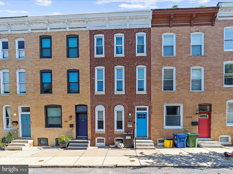Welcome to 418 E Lanvale Street — a beautifully renovated row home in the heart of Baltimore that blends historic charm with modern comfort. Featuring 4 spacious bedrooms and 3.5 bathrooms, this home was fully remodeled in 2021 and thoughtfully updated ever since. Hardwood and tile floors span most of the home, while smart Hue lighting and a Ring security system offers both convenience and peace of mind.
The stylish kitchen is a standout, boasting a full renovation in 2021 and a brand-new refrigerator (2024). Step outside onto the wooden deck off the second floor—perfect for relaxing or entertaining. Upstairs, comfort is ensured year-round with two added mini-split systems that keep the top level cool even in the summer. Enjoy private off-street parking with a Tesla charger (included) and laundry conveniently located on the second level. The roof was replaced in 2023, the hot water heater in 2021, and the HVAC has been regularly ser.viced.  This smart, spacious, and stylish home is ready for its next chapter—don't miss your chance to own a piece of Baltimore with the best of both worlds.