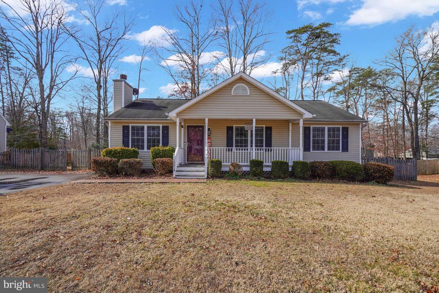 New buyer will love this well maintained 3 bedroom, 2 full bath Rambler close to everything waiting for our new buyer. Large Living Room boasting a gorgeous stone hearth wood burning fireplace. Harwood plank flooring throughout the living room and bedrooms. Large Kitchen with Ceramic tile flooring, Stainless Steel appliances, granite counter tops and a peninsula for added dining. Fully screened in back porch a place to get away and for your leisure. Usable front porch, too! Ceramic tile in the Primary bath and Hall bath. Newer double hung (top/bottom sections of the window tilt in) vinyl windows throughout the home. Whole house water filtration system that softens the water and makes your public water drinkable from the faucet. All of this is offered on a nice flat, .25 acre lot, with fully fenced backyard.