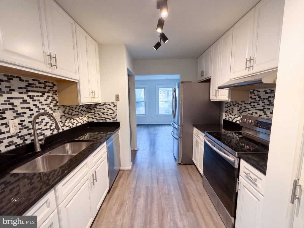 Photo of 706 Kaplan Court, HYATTSVILLE, MD 20785 (MLS # MDPG2221356)