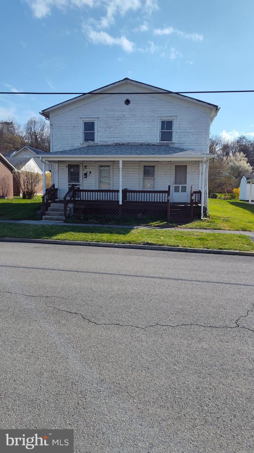 Two Apartment dwelling.  Inside needs work.  One side was rented and other side needs renovated.  Back partition added later needs fixed. Driveway on both sides of building and with a large back yard.  On street parking is available, too.  ESTATE SALE.  Two tracts for this property. Tract A = .29 and Tract B = .05.  Will only go Conventional or CASH!
NO REPAIRS WILL BE MADE.  SOLD "AS IS"