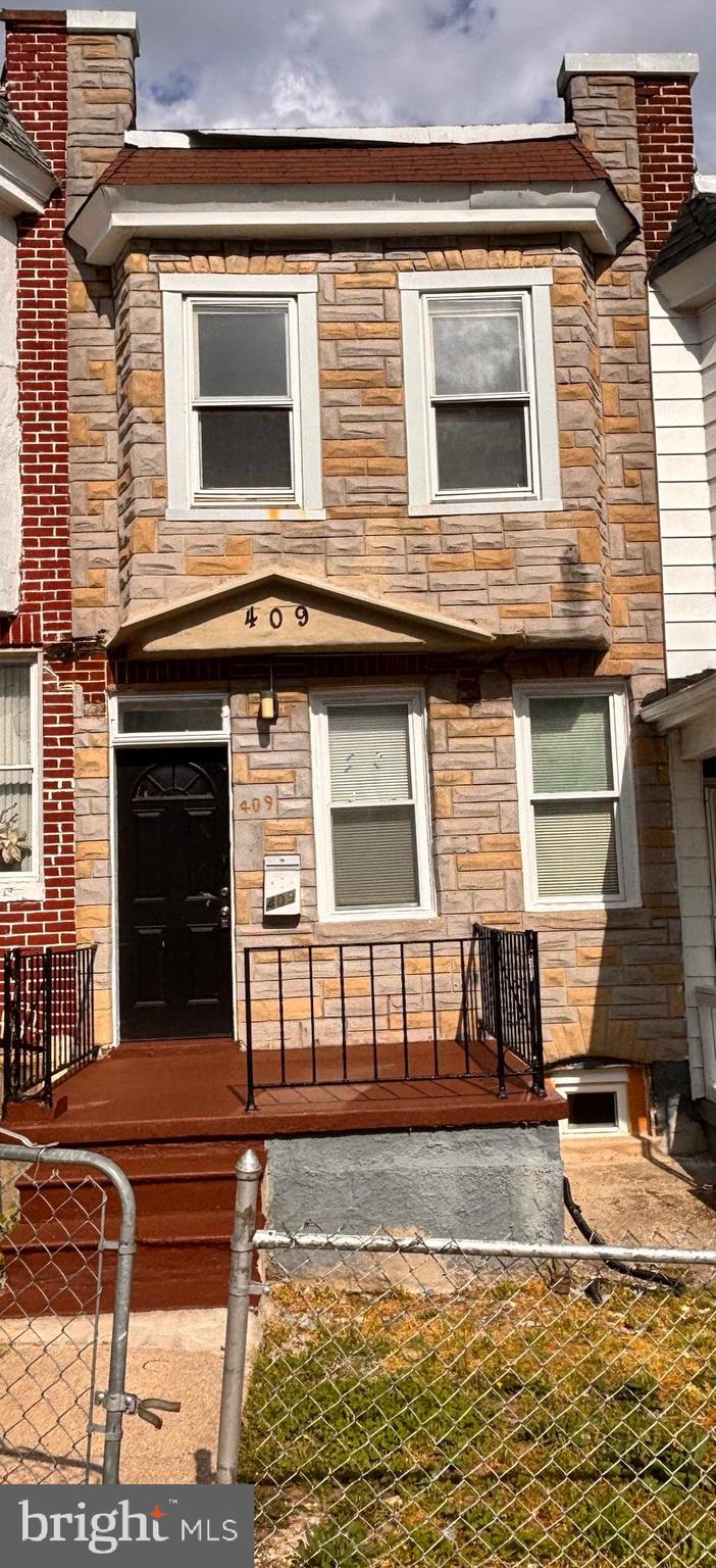 PRICE JUST REDUCED AND ABSOLUTE SALE IS NOW IN EFFECT AS THIS PROPERTY MUST SELL! THE HIGHEST OFFER OVER THE CURRENT REDUCED ASKING PRICE WILL BE ACCEPTED BY THE SELLER, VERY SIMILAR TO AN AUCTION. ALL OFFERS ARE DUE BY 8PM ON JUNE 23, 2025. The seller reserves the right to accept any offer prior to the deadline. Welcome to this beautiful renovated 3 bedroom & 1 bath rowhome . This home features modern renovated upgrades including a new spacious gourmet kitchen, upgraded quartz countertop, SS appliances, nice large white cabinets, beautiful backsplash, updated laminate & ceramic tile flooring, new WTW carpeting on 2nd floor, updated bathroom with new fixtures, sink, vanity & wall tile, freshly painted walls throughout, recessed lights, new CAC system, separate and open dining/living room areas, new roof, front porch for interacting with neighbors and much more. Improved basement with rec room space for family activities and entertainment along with a large storage/laundry room area. Great location conveniently located near major transportation routes, shopping, restaurants and local stores and attractions. Don't miss this great opportunity to own this affordable home for a great price that is cheaper than renting. Perfect for a first time home buyer looking to have low maintenance. Seller is motivated to get this closed fast so bring forth your best offer above the ABSOLUTE PRICING as it is priced below the last appraisal and current market value. Call helpful LA with any questions or to schedule an appt.