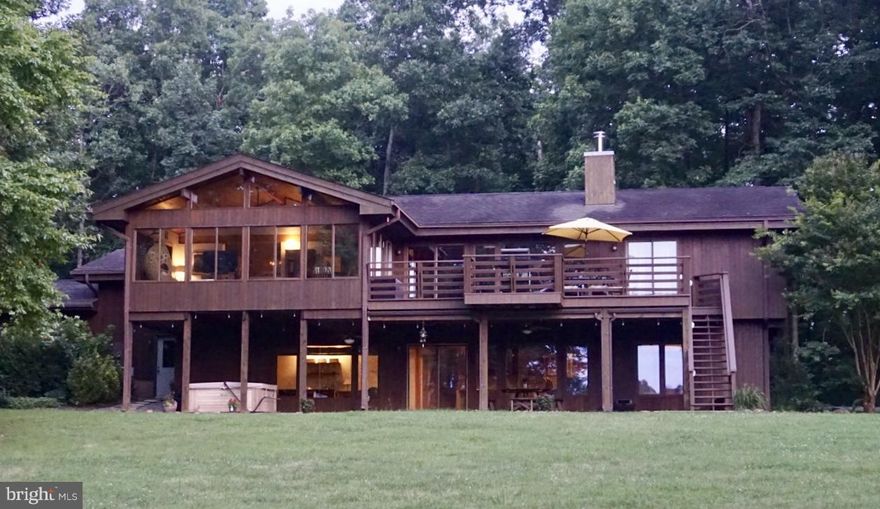 WOODED PRIVACY PLUS! Custom LINDAL post & beam home on 10+ private acres with gardens, firepit & abundance of windows to capture the fabulous views! Beautifully constructed 4 bedrms 3 bath home features large gourmet kitchen great room  sun room deck covered patio attached 3-car garage Workshop A MUST SEE if you are looking for a quality built home & unique floor plan. XFINITY HIGH SPEED INTERNET.