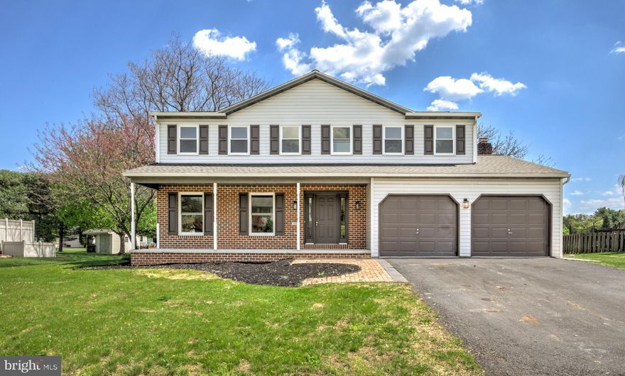 Welcome to 404 Clemens—a beautifully updated and move-in ready home offering space, style, and comfort in a desirable Dillsburg neighborhood. This spacious 4-bedroom, 2.5-bath home features warm, inviting hardwood floors and a thoughtfully designed layout perfect for both everyday living and entertaining. The bright living room flows seamlessly into the dining area and leads to a stunning, fully renovated kitchen complete with new cabinetry, upgraded quartz countertops, stainless steel appliances, and a designer tile backsplash. Just beyond, enjoy an additional living space highlighted by a charming brick fireplace and double glass doors that open to the backyard, creating the perfect indoor-outdoor flow. The main level also includes a stylishly updated half bath and convenient access to the attached 2-car garage. Upstairs, you’ll find four generously sized bedrooms, including a primary suite with a walk-in closet and a beautifully updated en-suite bath featuring a tiled walk-in shower and modern finishes. The unfinished basement provides ample storage or potential for future living space. Outside, enjoy spacious front and rear yards along with a brand new deck for all our outdoor activities. An additional storage shed adds convenience for storing outdoor equipment. Major updates—including a new roof and HVAC system—offer peace of mind for years to come. Ideally located with easy access to major routes, this home combines comfort, convenience, and modern updates—don’t miss your opportunity to make it yours!