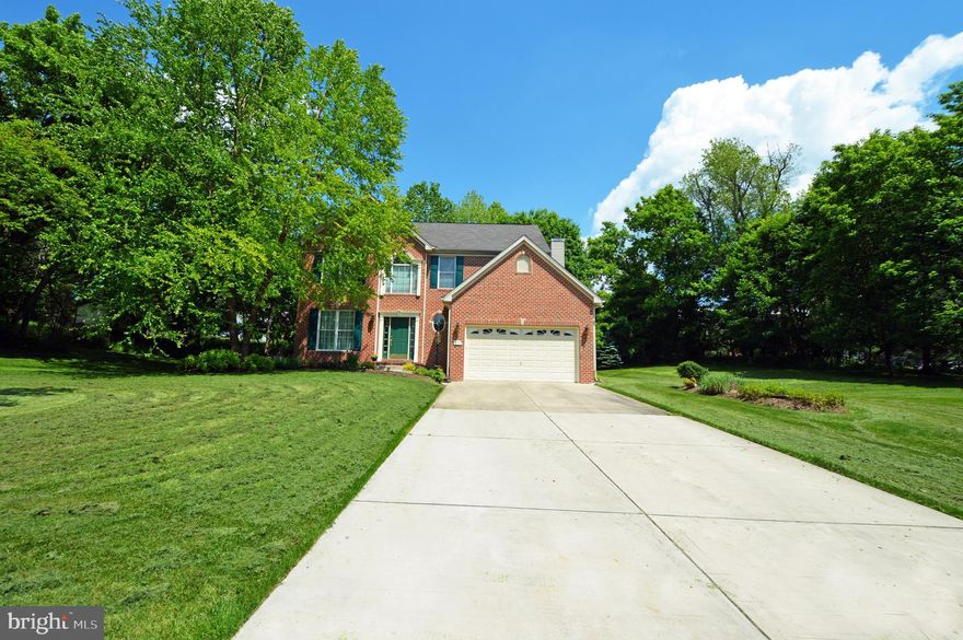 Welcome Home! Located in highly desirable Sparks. Close to shopping and NCR trail. One owner, well maintained, 4 bedroom, 2 1/2 bath, 2 car attached garage, located on a quiet cul de sac.  Enter the foyer into  formal living and dining rooms. Relax in the bright sunroom and dine on the secluded patio. Entertain family and friends in the welcoming family room with fireplace and open kitchen. Spacious basement ready to be finished. Generac GP7500E Generator.