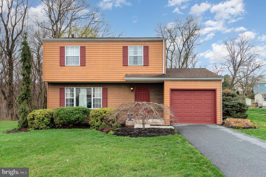 This beautifully maintained and updated one owner home is situated on a lovely .43 acre wooded lot. Recent improvements include: New carpeting throughout (2025), Water heater (2022), Central air (2021) and Driveway (2021). Additional upgrades include a fully remodeled kitchen, powder room, full bath, new wood trim and new doors throughout (2013-2015) and Furnace (2010). The first floor offers a large living room, dining room, powder room and eat-in kitchen with ceramic tile floors and granite countertops that opens to a screened porch with ceiling fan. The adjoining deck overlooks the private, wooded rear yard. The owner's suite connects to the 2 floor full bath and offers an additional vanity. The two additional bedrooms have access to the renovated, second floor bath as well. The garage has an automatic opener, rear door and interior access to the home. The large basement provides ample storage and includes a laundry area. Refrigerator, washer and dryer will convey to the new owner.