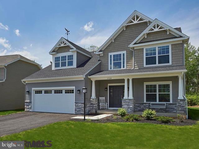 Reduced to sell, freshly painted Craftsman style two story home with welcoming front covered porch, open floor plan with 9' ceiling, spacious great room with gas fireplace. Formal dining room and eat in kitchen. first floor master suite with oversized custom tiled shower, large walk in closet. Second floor offers an amazing loft plus 3 other bedrooms and a full bath. Two of the rooms have walk in closet. Unfinished poured concrete basement with insulation, rough in for future bath and two egress windows for additional living space. The unique village at Penn State neighborhood amenities include a private clubhouse, fitness center, outdoor pool & walking trails. Outstanding location just minutes from Penn State University, Beaver Stadium, Jordan Center, airport and premiere shopping. 3.8 miles to Penn State campus