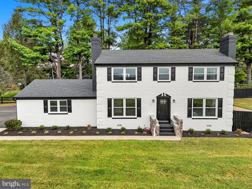 Seller will welcome showings and a back up offer! Welcome to this beautifully renovated brick Colonial with timeless farmhouse charm! This spacious 4-bedroom, 2.5-bath home offers an open floor plan filled with tons of natural light and stylish updates throughout. Step inside to find new luxury vinyl plank flooring, fresh paint, and brand-new windows. The farmhouse-style eat-in kitchen is stunning, featuring all-new cabinetry, quartz countertops and a  large island — perfect for both daily living and entertaining. On the main level, you'll find two living rooms, two cozy fireplaces, a convenient half bath, pantry and a laundry area — all designed for comfort and functionality. Upstairs, the large primary suite boasts a stunning custom en suite bath with a walk-in shower, while three additional bedrooms share a beautifully renovated full hall bathroom. Step outside to your private backyard oasis — relax by the pool, unwind on the patio, and take in breathtaking panoramic views from your beautifully landscaped yard.This move-in ready home blends classic Colonial architecture with modern farmhouse finishes — a rare find you don’t want to miss!