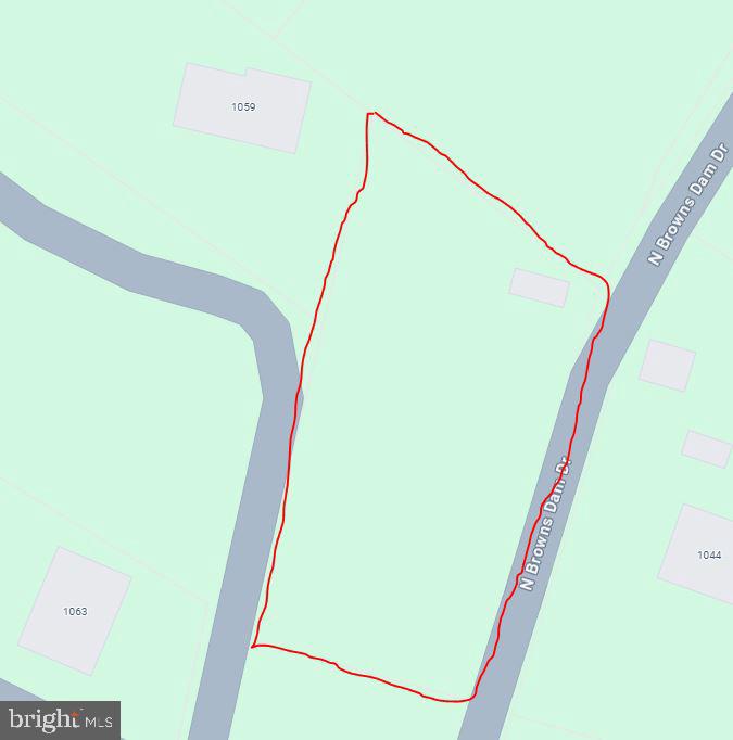 Build your dream home on this spacious half-acre lot! Nestled in a quiet setting, this buildable parcel offers public water and sewer hook-up availability, saving you time and cost during construction. No flood insurance is required, and there's no builder tie-in—bring your favorite builder and start planning your future today!
